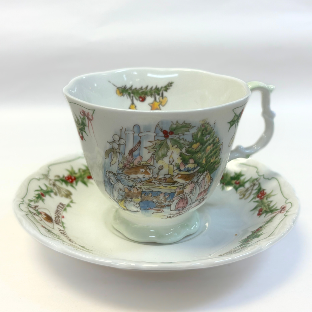 Royal Doulton Merry Midwinter Cup & Saucer